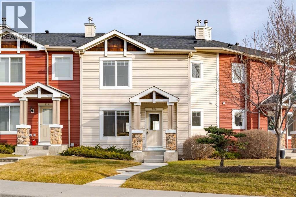 Row / Townhouse for Sale in 122 Panamount Drive NW|Calgary, Alberta T3K6K3