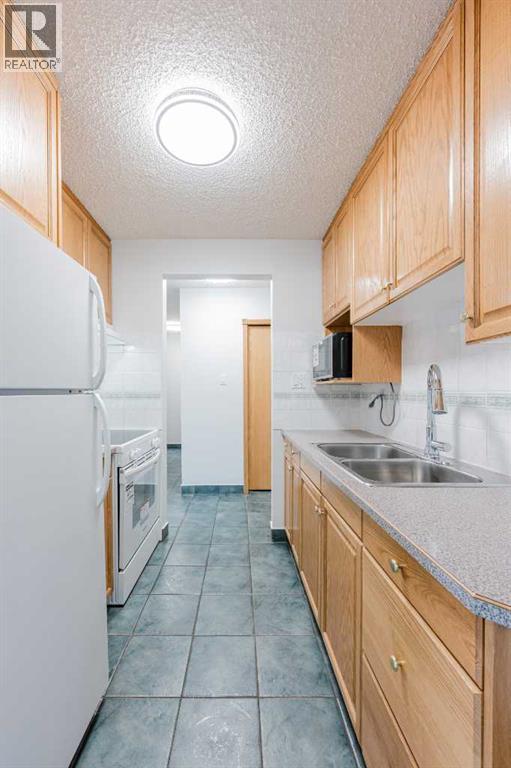 Apartment for Sale in 303, 635 56 Avenue SW|Calgary, Alberta T2V0G9 5