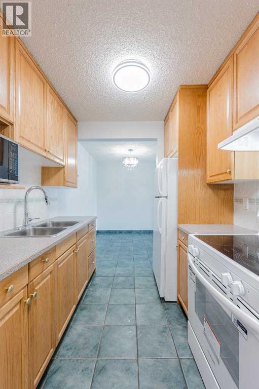 Apartment for Sale in 303, 635 56 Avenue SW|Calgary, Alberta T2V0G9 4