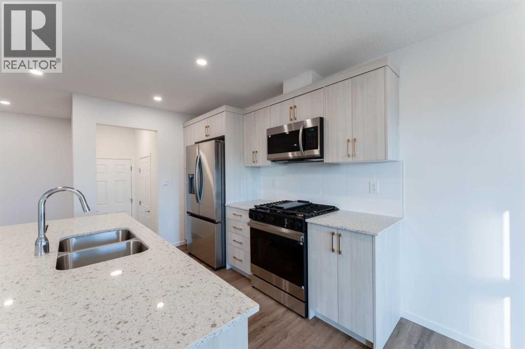 Row / Townhouse for Sale in 1170 148 Avenue NW|Calgary, Alberta T3P2G9 3