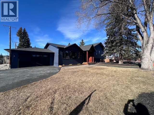 House for Sale in 1 Spruce Bank Crescent SW|Calgary, Alberta T3C3b5