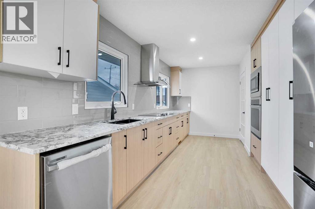 House for Sale in 6116 Buckthorn Road NW|Calgary, Alberta T2K2Z1 5