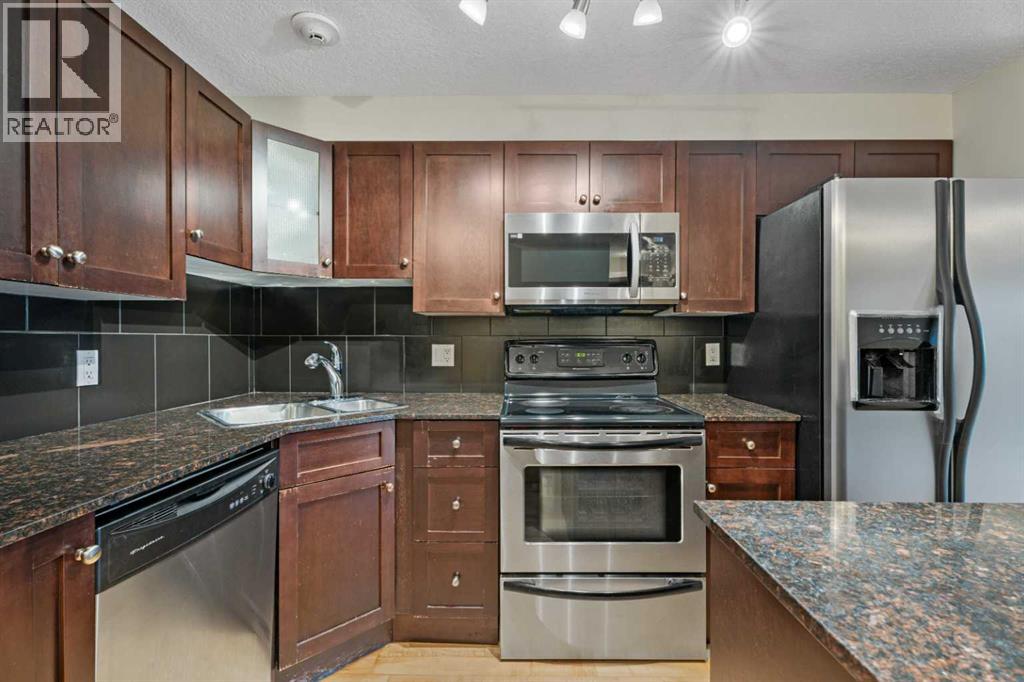 Apartment for Sale in 404, 728 3 Avenue NW|Calgary, Alberta T2N0J1 4