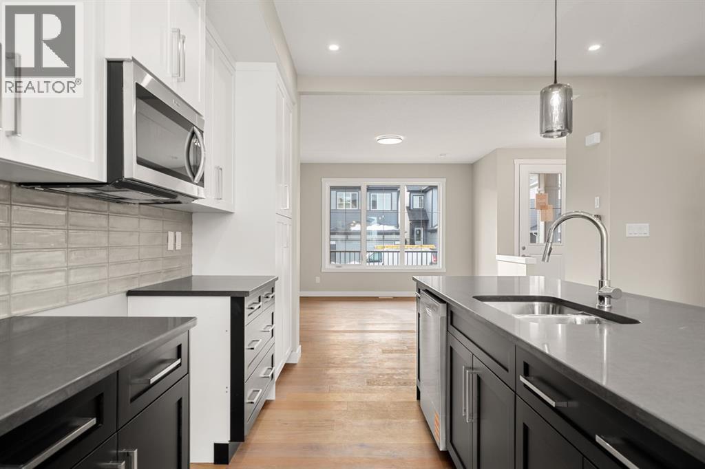 Duplex for Sale in 122 Sora Gardens SE|Calgary, Alberta T3S0V3 4