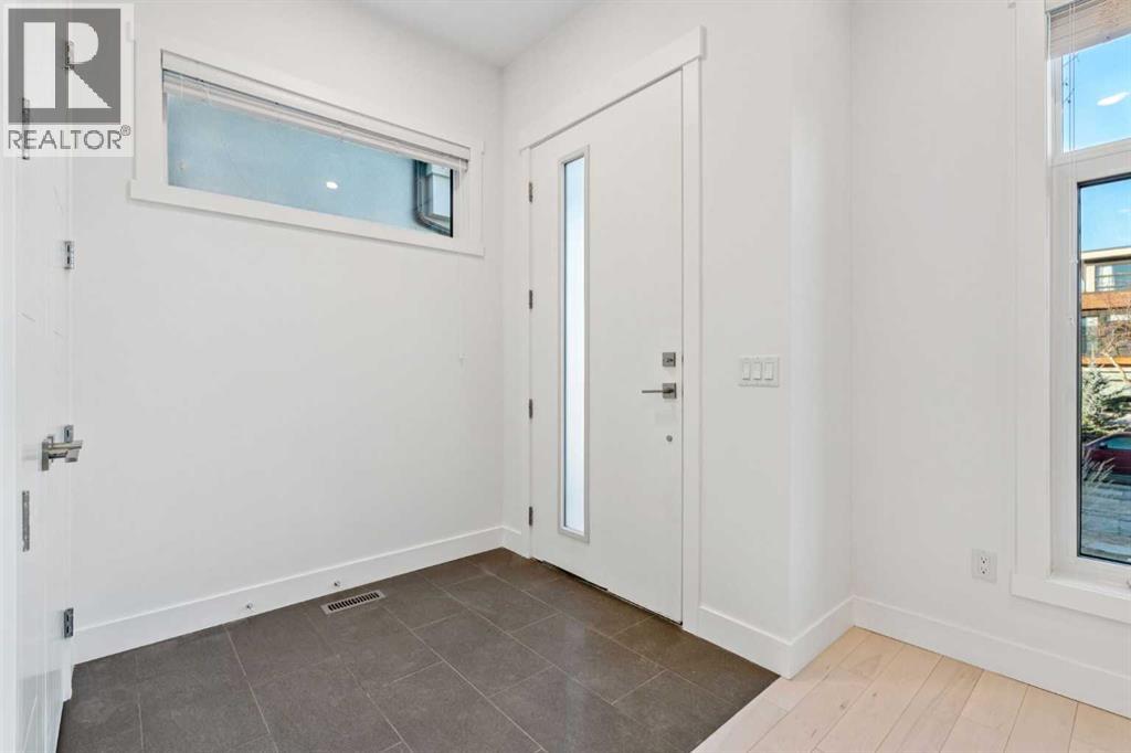 Duplex for Sale in 2409 28 Avenue SW|Calgary, Alberta T2T1L1 5