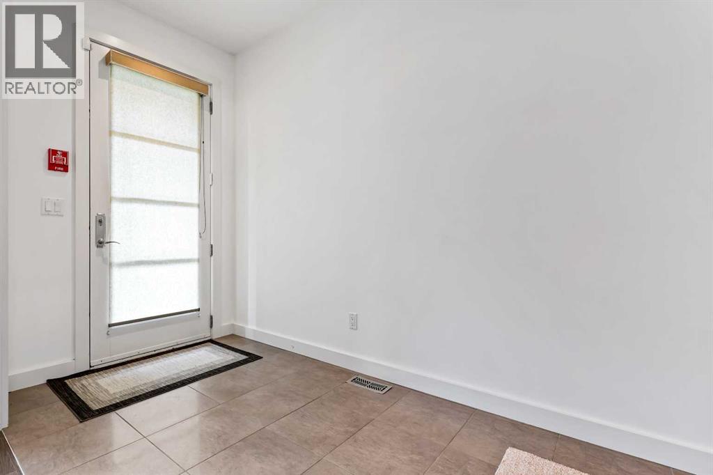 Row / Townhouse for Sale in 606 Aspen Meadows Hill SW|Calgary, Alberta T3H0G3 3