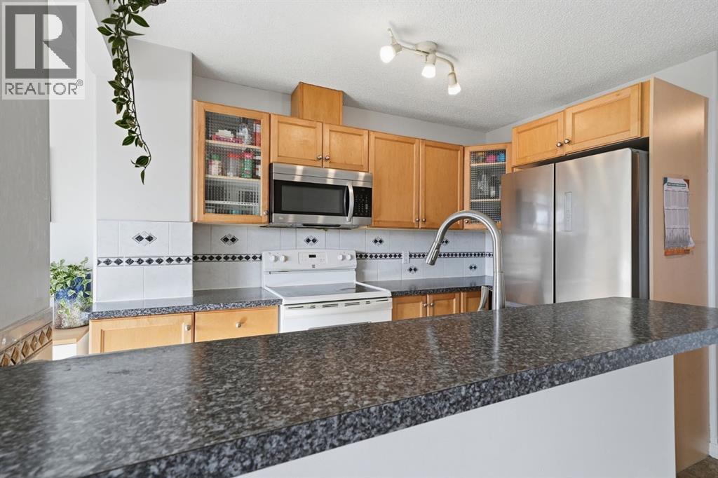 Row / Townhouse for Sale in 49 Royal Birch Mount NW|Calgary, Alberta T3G5W7 4