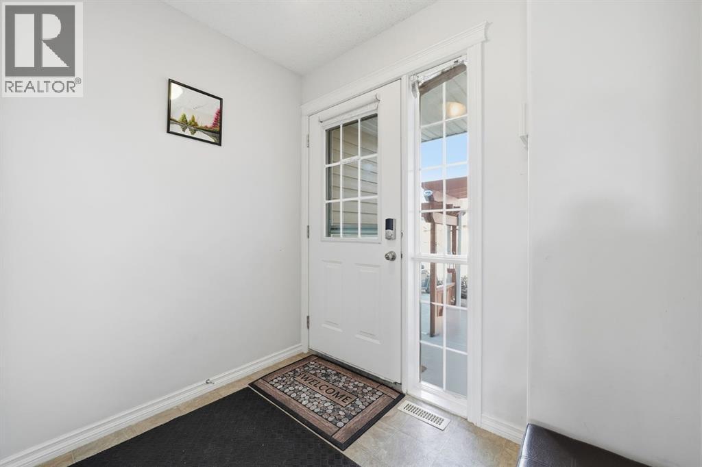 Row / Townhouse for Sale in 49 Royal Birch Mount NW|Calgary, Alberta T3G5W7 2