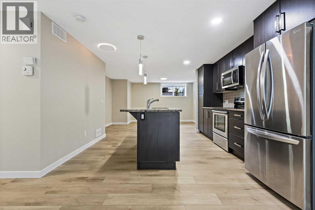 Row / Townhouse for Sale in 147 Mckenzie Towne Close SE|Calgary, Alberta T2Z1A7 2