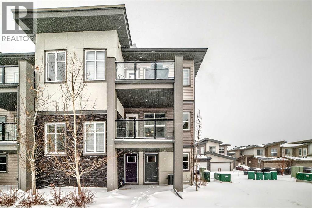 Row / Townhouse for Sale in 44 Spring Creek Common SW|Calgary, Alberta T2E6E2