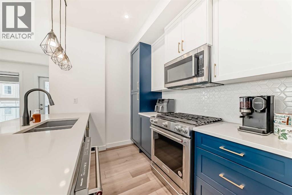 Row / Townhouse for Sale in 44 Spring Creek Common SW|Calgary, Alberta T2E6E2 5