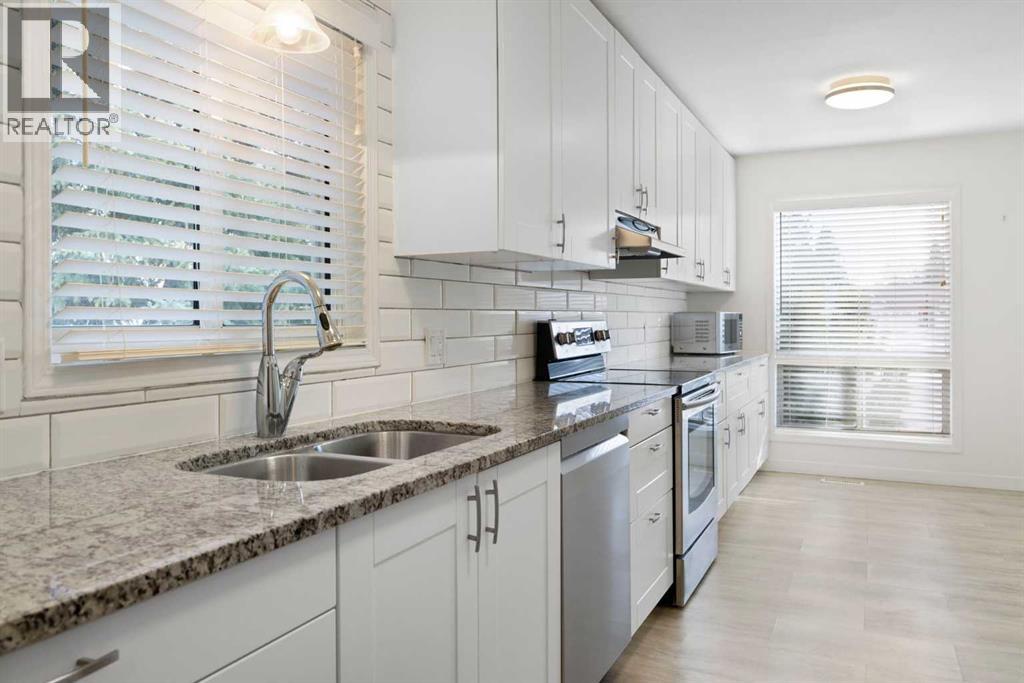 Row / Townhouse for Sale in 84 Deer Ridge Close SE|Calgary, Alberta T2J7C2 4