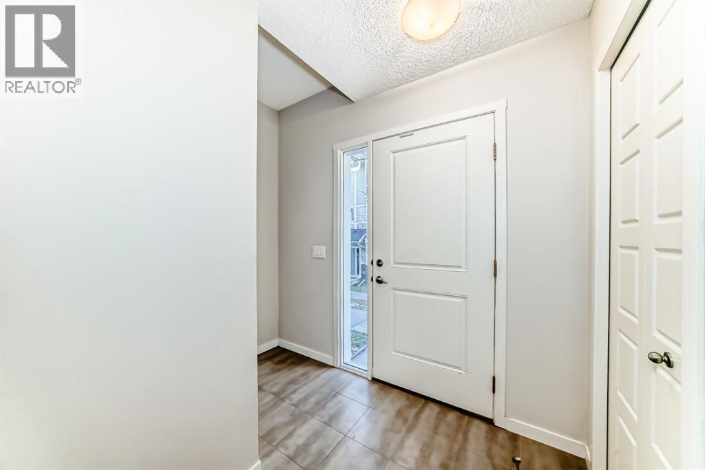 Row / Townhouse for Sale in 409 NOLANLAKE Villas NW|Calgary, Alberta T3R0Z7 2