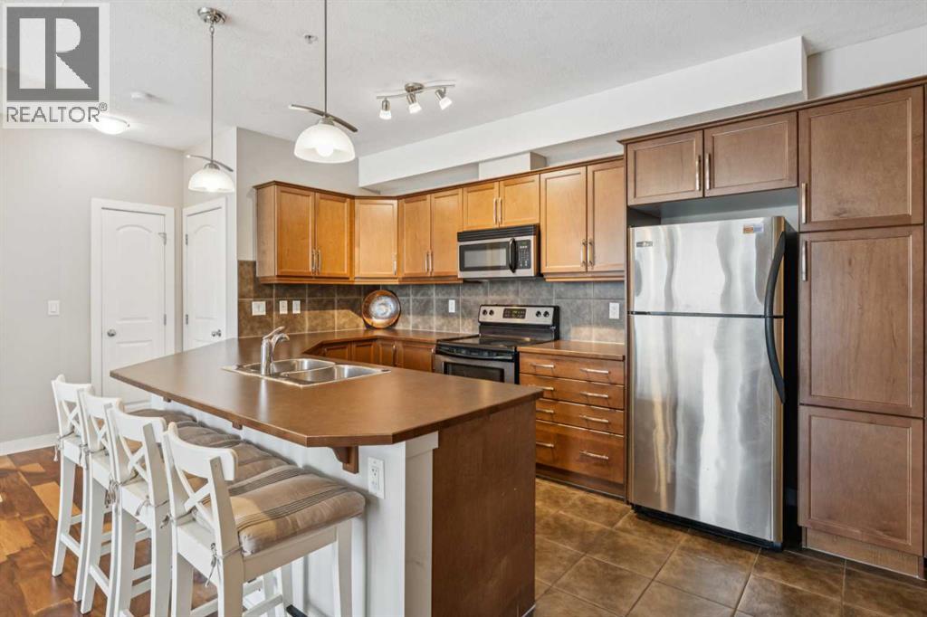 Apartment for Sale in 215, 15304 Bannister Road SE|Calgary, Alberta T2X0M8 5