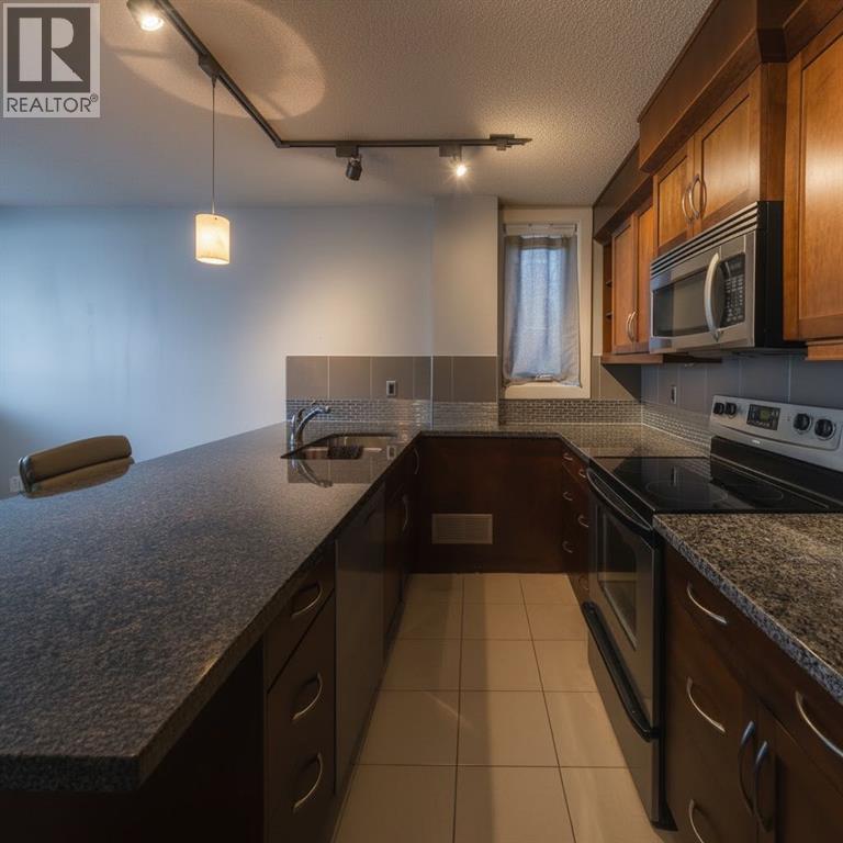 Apartment for Sale in 104, 1534 15 Avenue SW|Calgary, Alberta T3C0X9 4