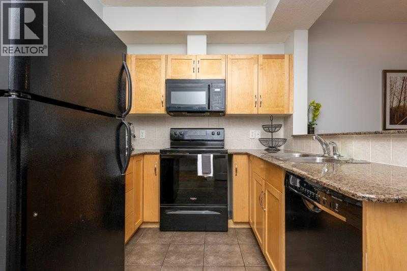 Apartment for Sale in 204, 5720 2 Street SW|Calgary, Alberta T2H3B3 4