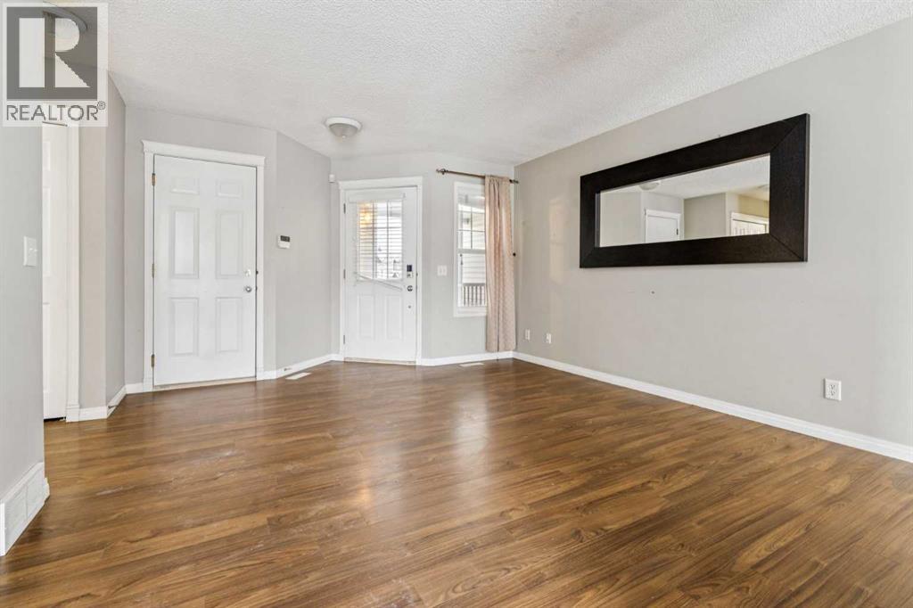 Row / Townhouse for Sale in 157 Hidden Creek Gardens NW|Calgary, Alberta T3A6J4 5