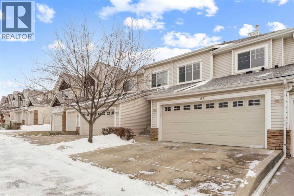 Row / Townhouse for Sale in 157 Hidden Creek Gardens NW|Calgary, Alberta T3A6J4 2