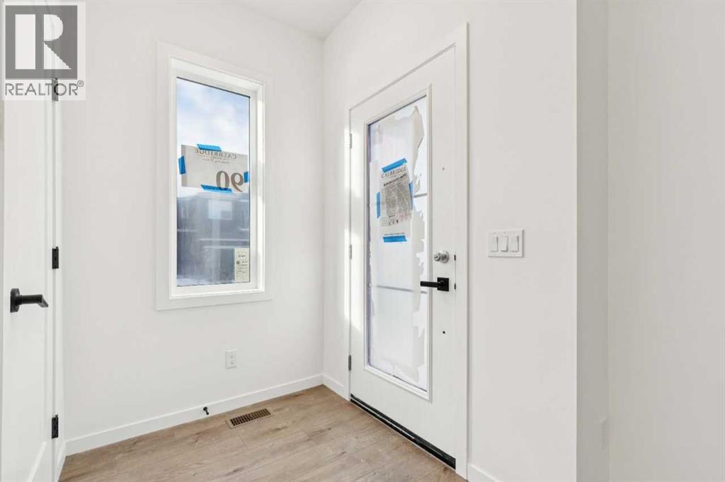 House for Sale in 90 Bluerock Hill SW|Calgary, Alberta T2Y0V6 3