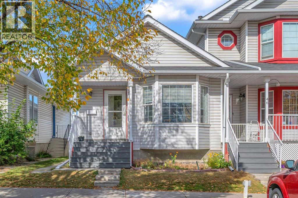 Row / Townhouse for Sale in 48 Martin Crossing Court NE|Calgary, Alberta T3J3P3 2