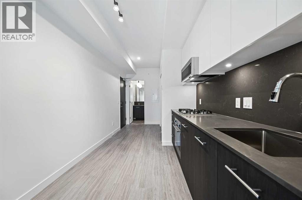 Apartment for Sale in 704, 730 2 Avenue SW|Calgary, Alberta T2P1R8 5