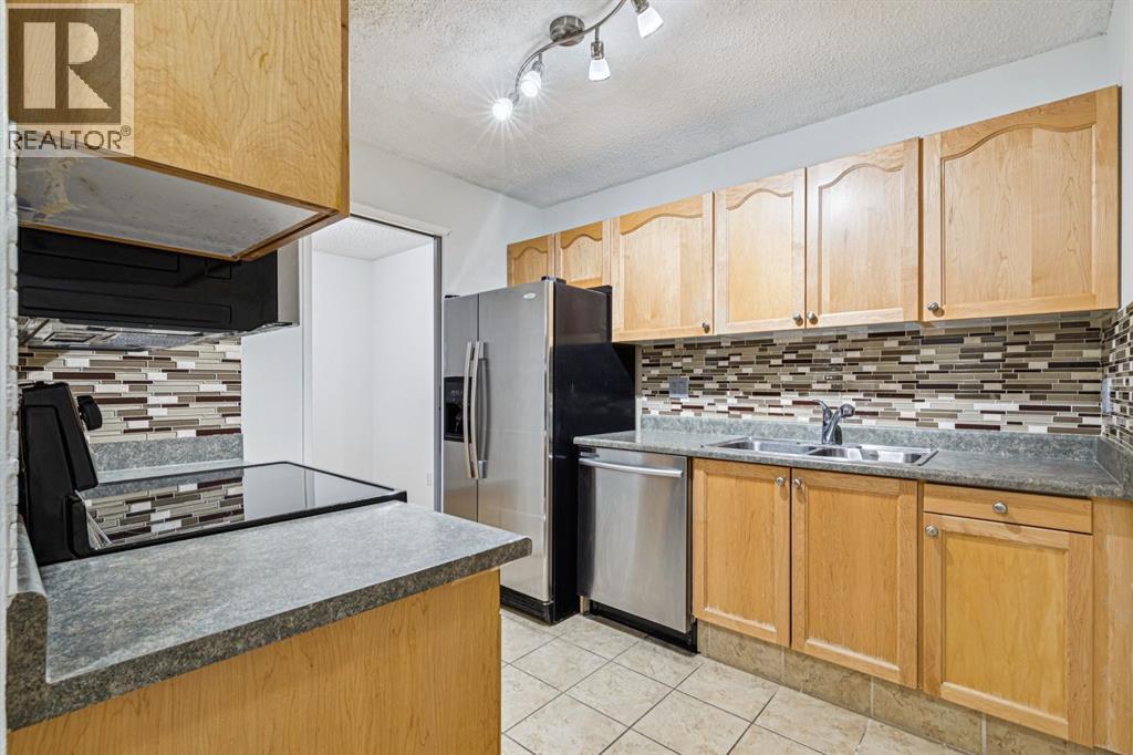 Apartment for Sale in 404, 537 14 Avenue SW|Calgary, Alberta T2R0M7 2