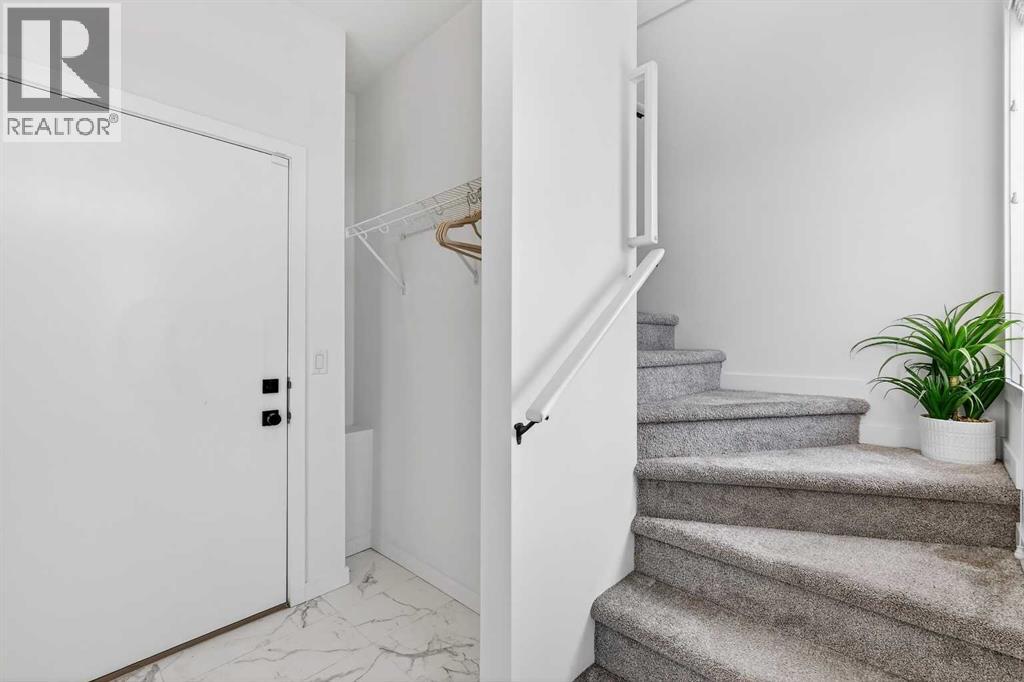 Row / Townhouse for Sale in 2422 210 Avenue SE|Calgary, Alberta T2X4C2 3