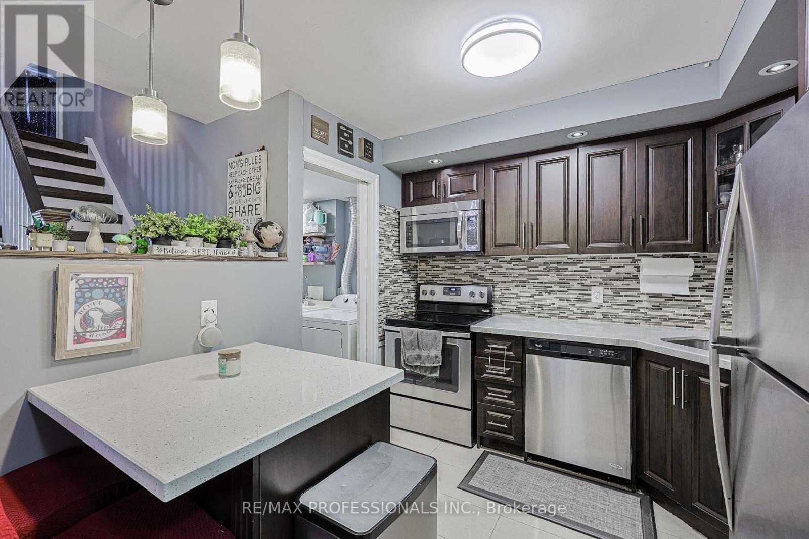 Row / Townhouse for Sale in 318 - 364 THE EAST MALL STREET|Toronto (Islington-City Centre West), Ontario M9B6C5 4