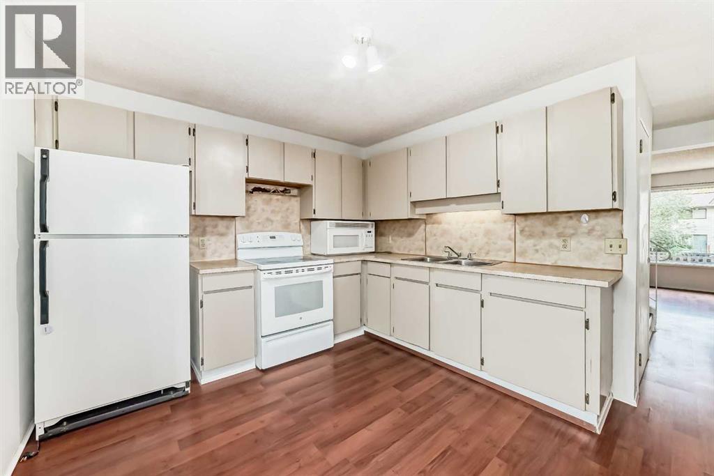 Row / Townhouse for Sale in #11, 380 Bermuda Drive NW|Calgary, Alberta T3K2B2 4