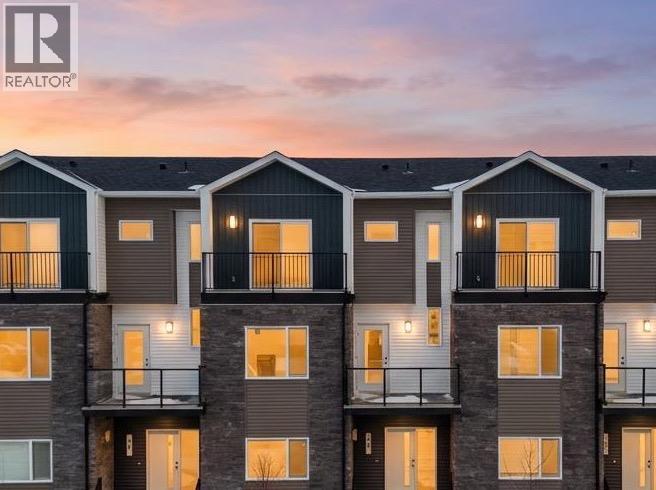 Row / Townhouse for Sale in 118 Red Sky Villas NE|Calgary, Alberta T3N2M2