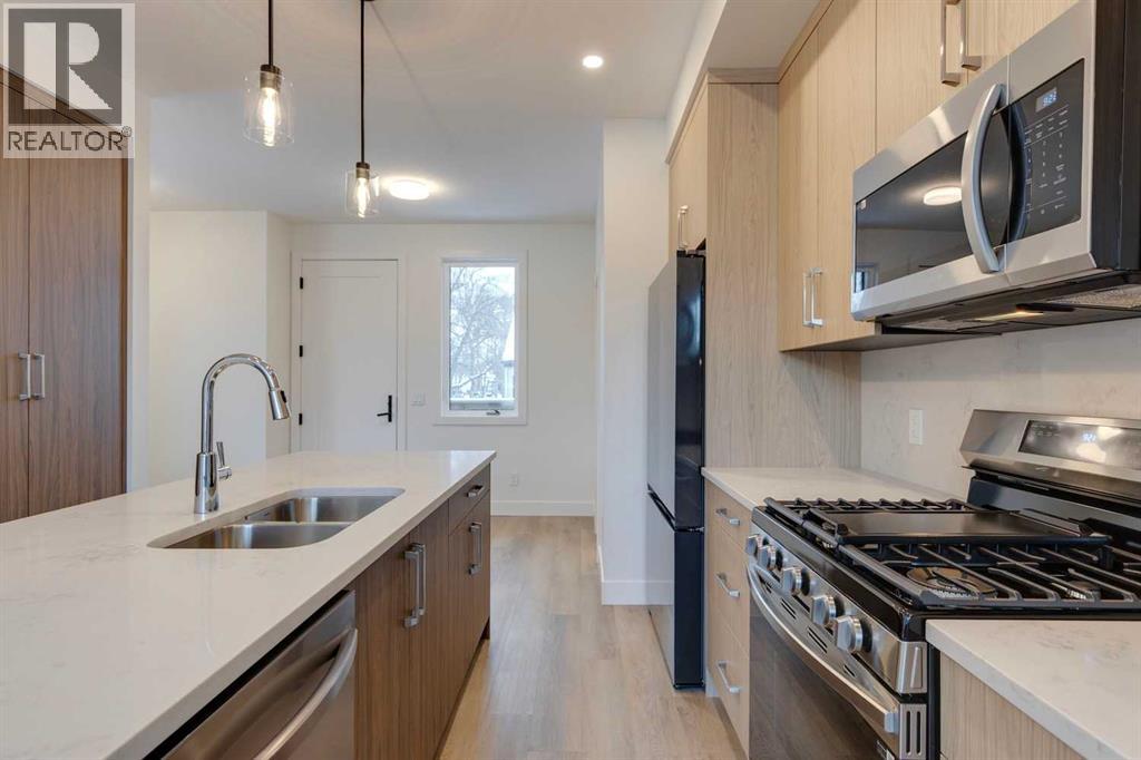 Row / Townhouse for Sale in 741 21 Avenue NW|Calgary, Alberta T2M1K2 4