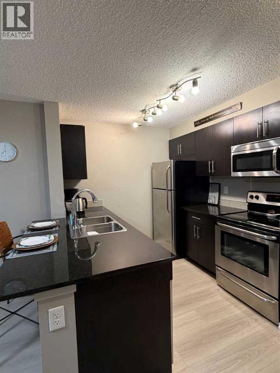 Apartment for Sale in 3416, 81 Legacy Boulevard SE|Calgary, Alberta T2X2B9 5