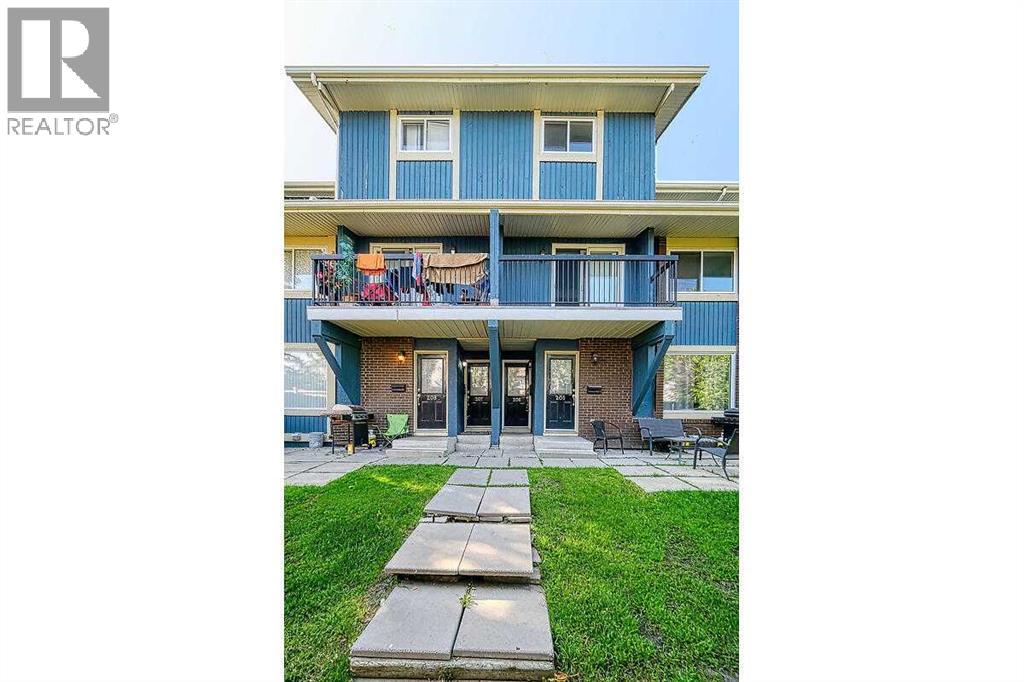 Row / Townhouse for Sale in 206, 2200 Woodview Drive SW|Calgary, Alberta T2W3N6 2