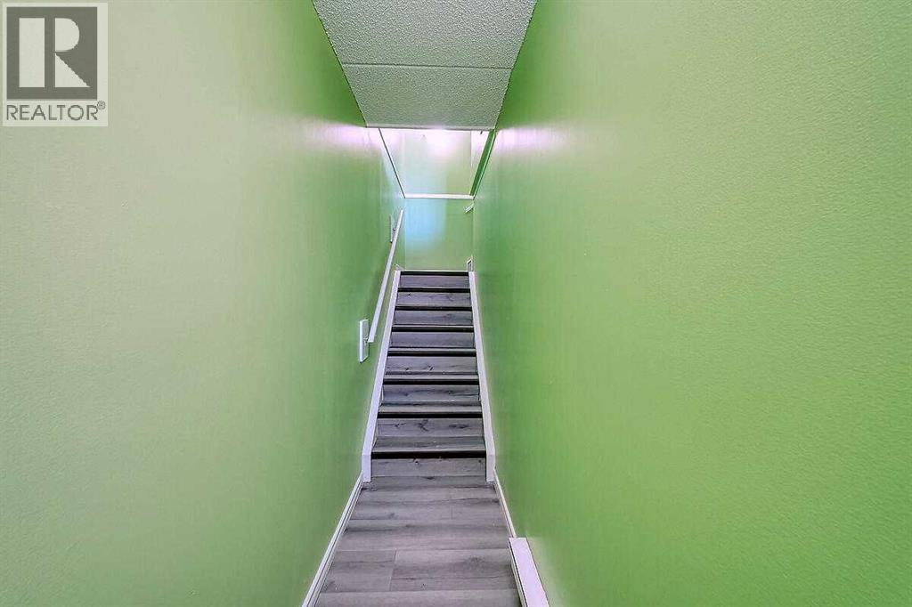 Row / Townhouse for Sale in 206, 2200 Woodview Drive SW|Calgary, Alberta T2W3N6 5