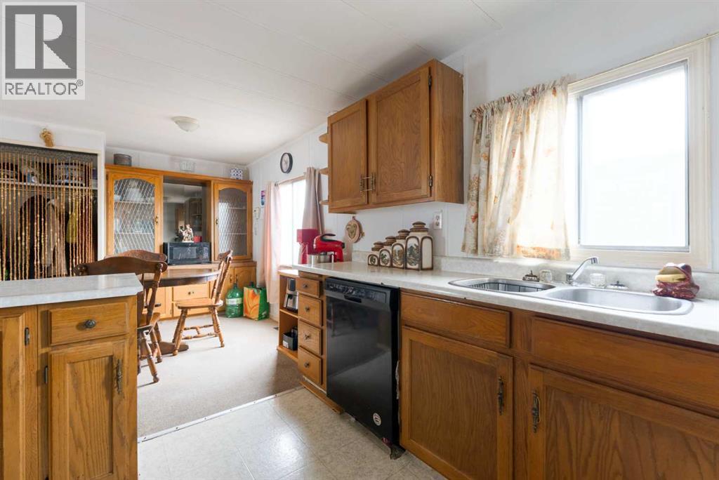 Mobile Home for Sale in 302, 6220 17 Avenue SE|Calgary, Alberta T2A0W6 4