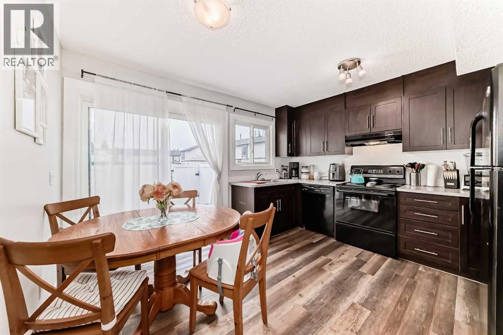 Row / Townhouse for Sale in 1227 137 Avenue SE|Calgary, Alberta T2J6N5 2