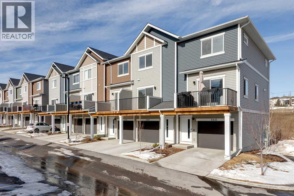 Row / Townhouse for Sale in 140 Tuscany Summit Square NW|Calgary, Alberta T3L0G1