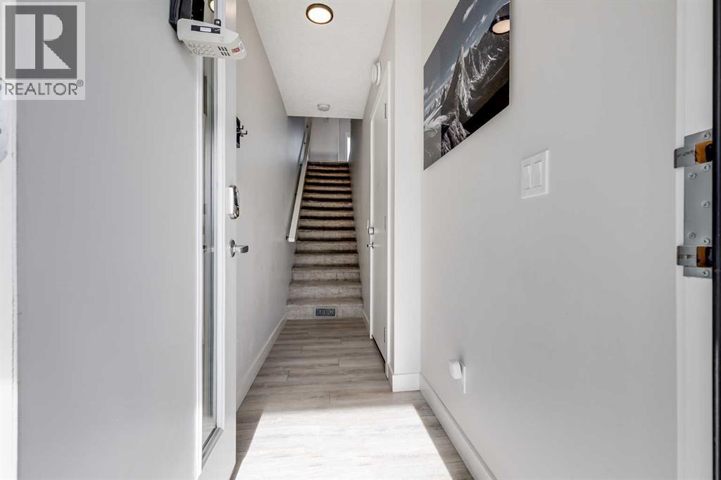 Row / Townhouse for Sale in 140 Tuscany Summit Square NW|Calgary, Alberta T3L0G1 3