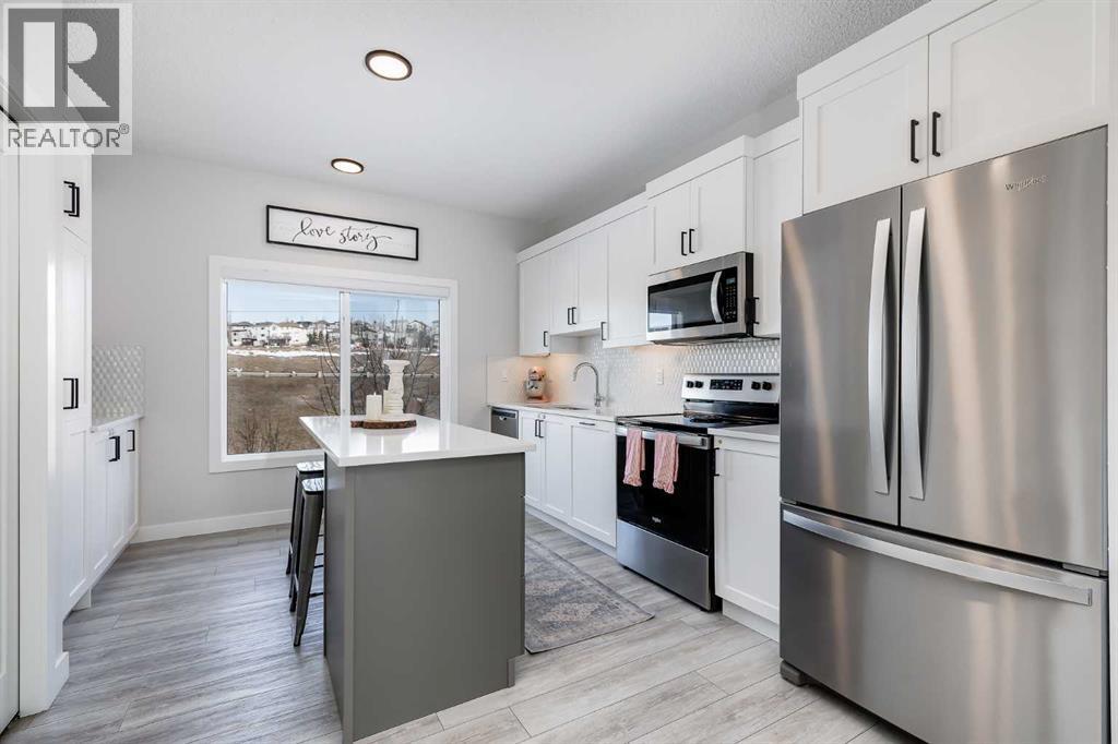 Row / Townhouse for Sale in 140 Tuscany Summit Square NW|Calgary, Alberta T3L0G1 4