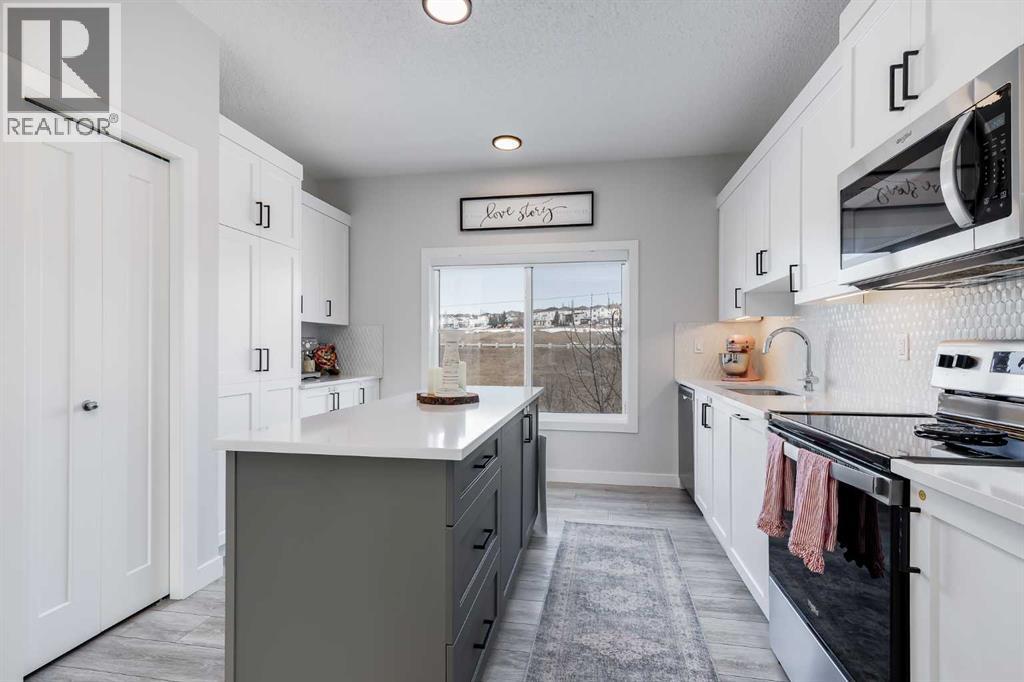 Row / Townhouse for Sale in 140 Tuscany Summit Square NW|Calgary, Alberta T3L0G1 5