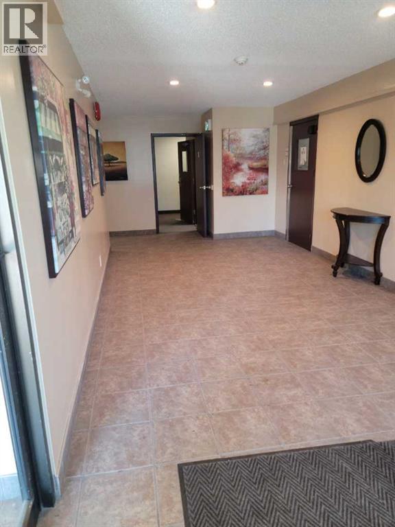 Apartment for Sale in 209, 1712 38 Street SE|Calgary, Alberta T2A1H1 2