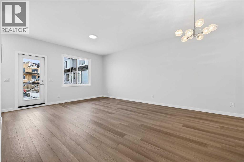 Row / Townhouse for Sale in 10 Hotchkiss Parade SE|Calgary, Alberta T3S0X5 2