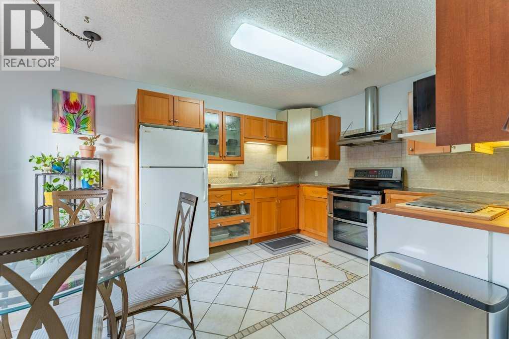 Row / Townhouse for Sale in 9, 6503 Ranchview Drive NW|Calgary, Alberta T3G1P2 4