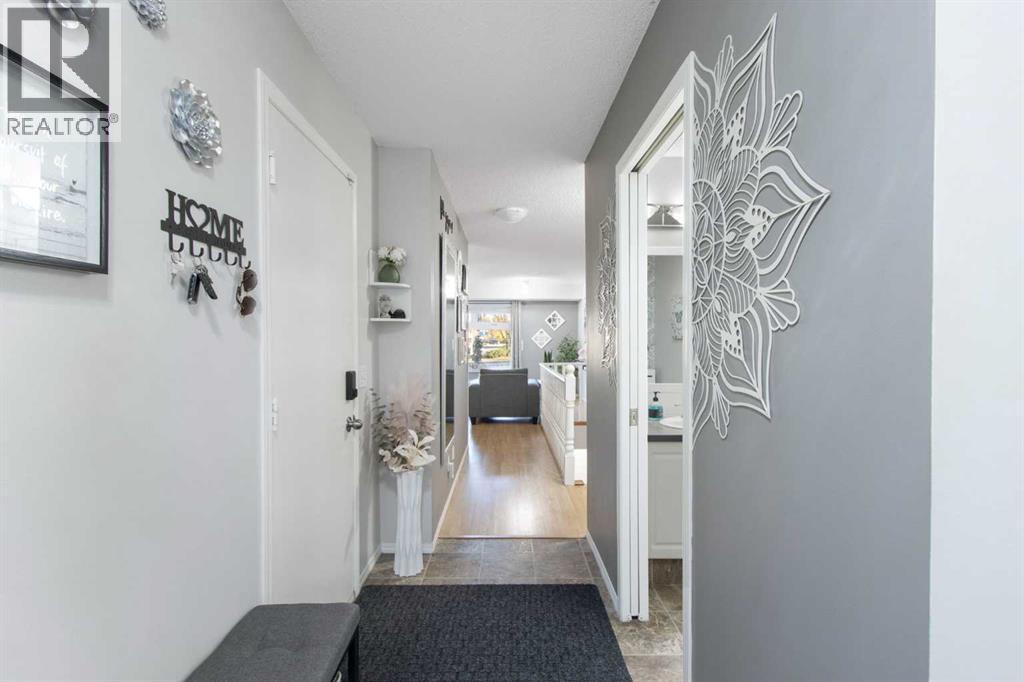 Row / Townhouse for Sale in 206 Mt Aberdeen Manor SE|Calgary, Alberta T2Z3N8 3