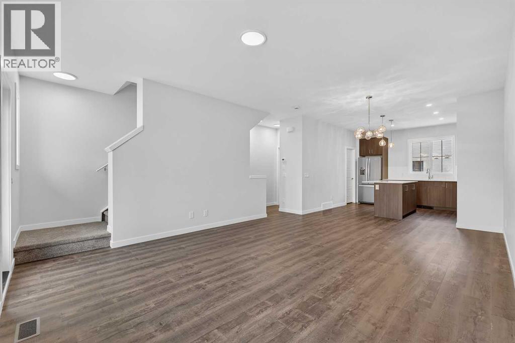 Row / Townhouse for Sale in 172 Hotchkiss Common SE|Calgary, Alberta T3S0X5