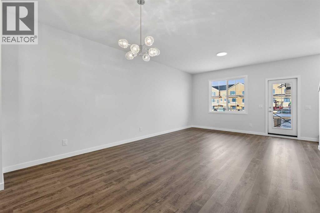 Row / Townhouse for Sale in 172 Hotchkiss Common SE|Calgary, Alberta T3S0X5 5