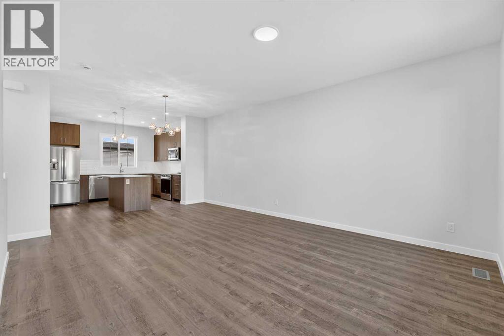 Row / Townhouse for Sale in 172 Hotchkiss Common SE|Calgary, Alberta T3S0X5 3