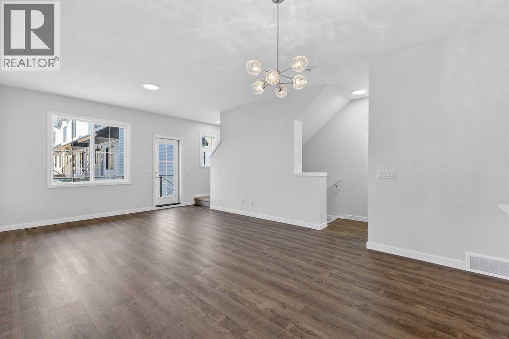 Row / Townhouse for Sale in 172 Hotchkiss Common SE|Calgary, Alberta T3S0X5 4