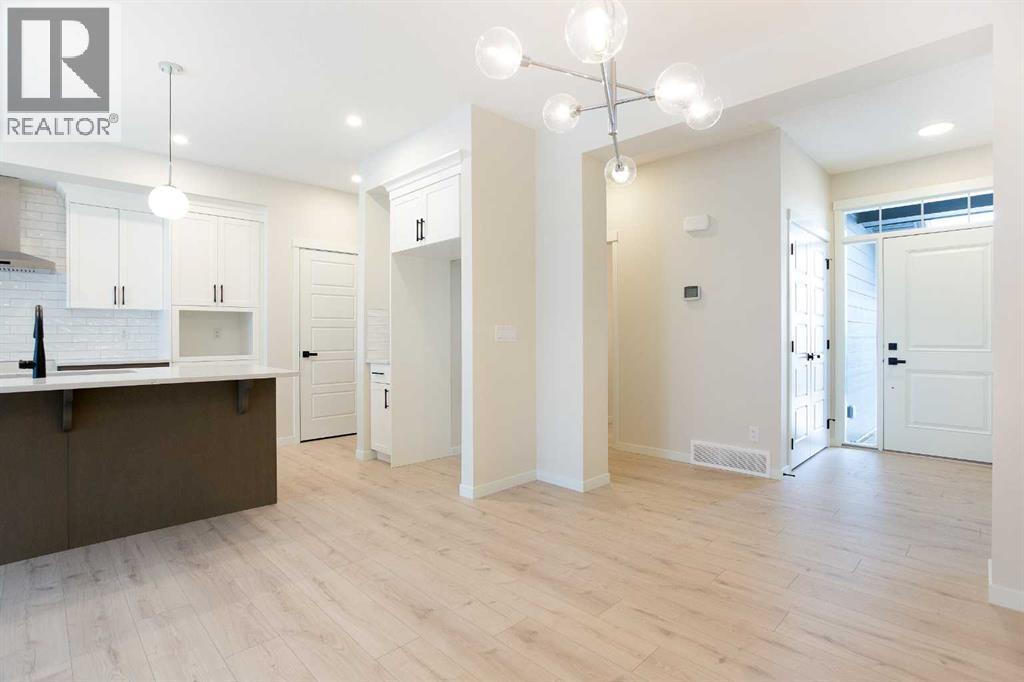 Duplex for Sale in 53 Creekside Passage SW|Calgary, Alberta T2X5V6 4