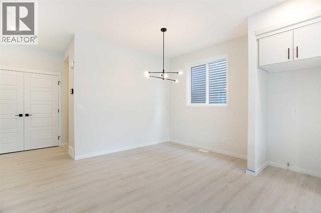 Duplex for Sale in 49 Creekside Passage SW|Calgary, Alberta T2X5V6 3